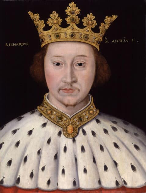 royal portrait of King Richard II, his boy-ish face framed by short red hair and a gold crown. His royal robes are white fur with black spots, and he looks immature and baby-faced.