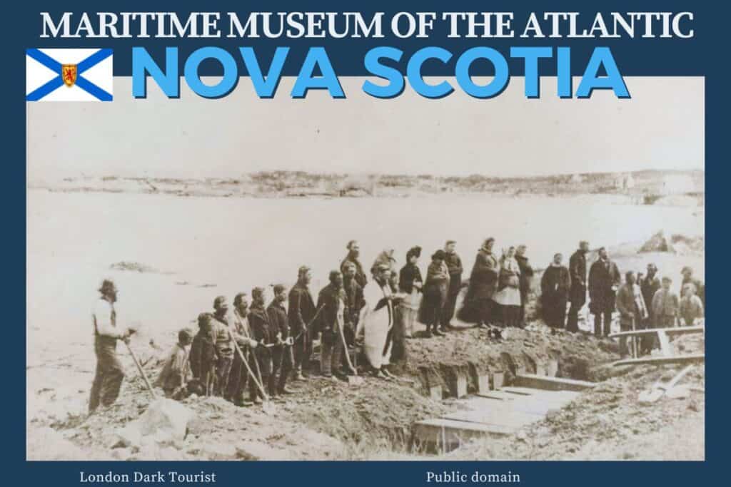 Historical black and white photo of a burial ceremony for Titanic victims, displayed at the Maritime Museum of the Atlantic in Nova Scotia, providing a poignant glimpse into the aftermath of the tragedy.